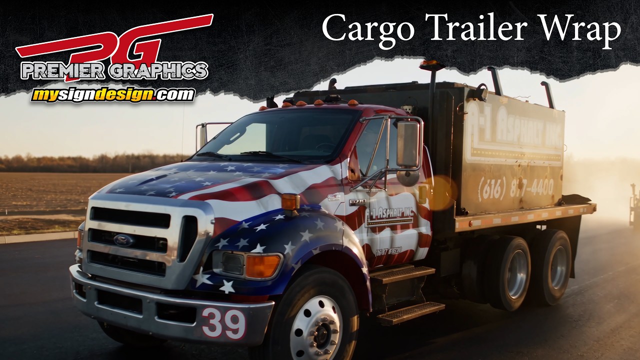 A-1 Asphalt work truck with an American flag wrap across the cab.