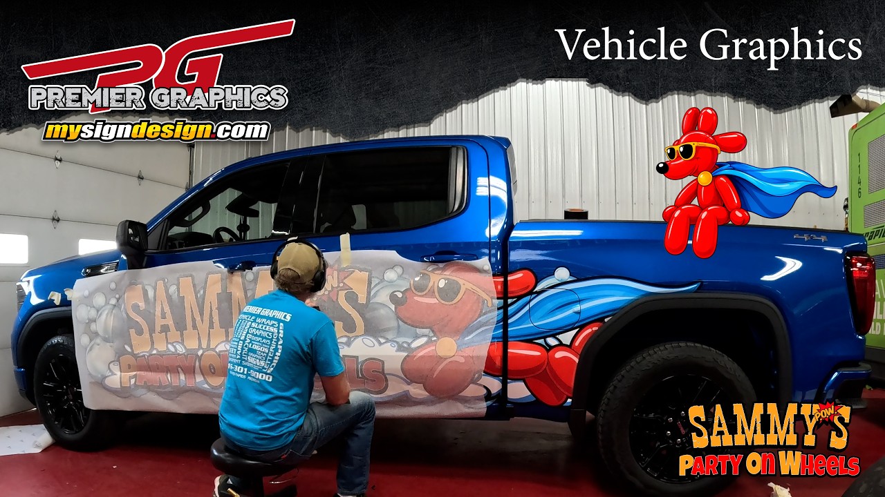 A Premier Graphics installer applying Sammy’s Party on Wheels graphics to a blue pickup, with the balloon-dog mascot in the presentation.
